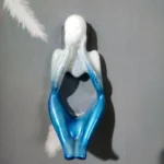 Glittery blue and white angel figurine hanging against a gray background. - Bling On Decor® | Luxury Handmade Home Decor ANJU BALA