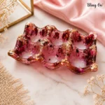 Pink wavy-edged glass tray with gold foil flakes, decorative jewelry or trinket dish on marble surface. - Bling On Decor® | Luxury Handmade Home Decor ANJU BALA