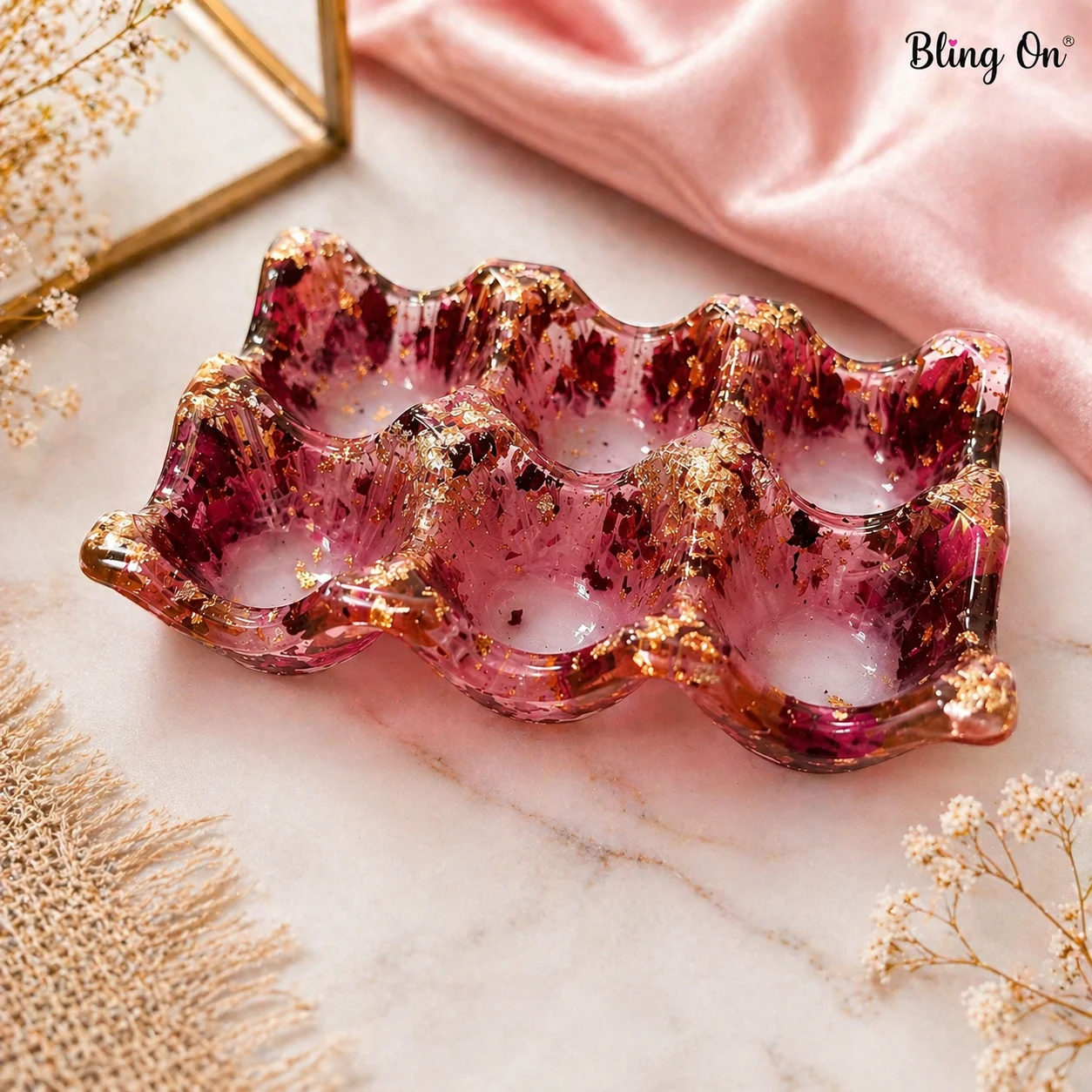 Pink wavy-edged glass tray with gold foil flakes, decorative jewelry or trinket dish on marble surface. - Bling On Decor® | Luxury Handmade Home Decor ANJU BALA