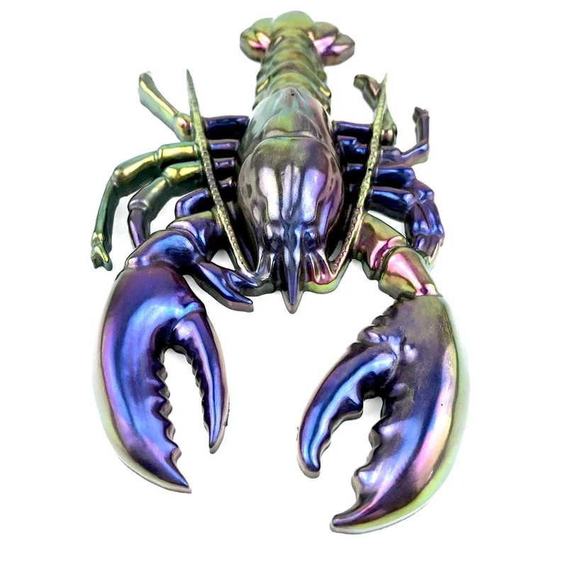Metallic rainbow-colored lobster sculpture viewed from above against a white background. - Bling On Decor® | Luxury Handmade Home Decor ANJU BALA