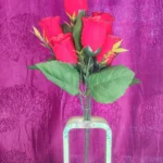 Bouquet of red roses in a glass vase nestled in a mint-green stand against a purple textured backdrop - Bling On Decor® | Luxury Handmade Home Decor ANJU BALA