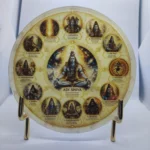 Decorative circular plate showing multiple small portraits of Hindu deities around a central figure, on a stand. - Bling On Decor® | Luxury Handmade Home Decor ANJU