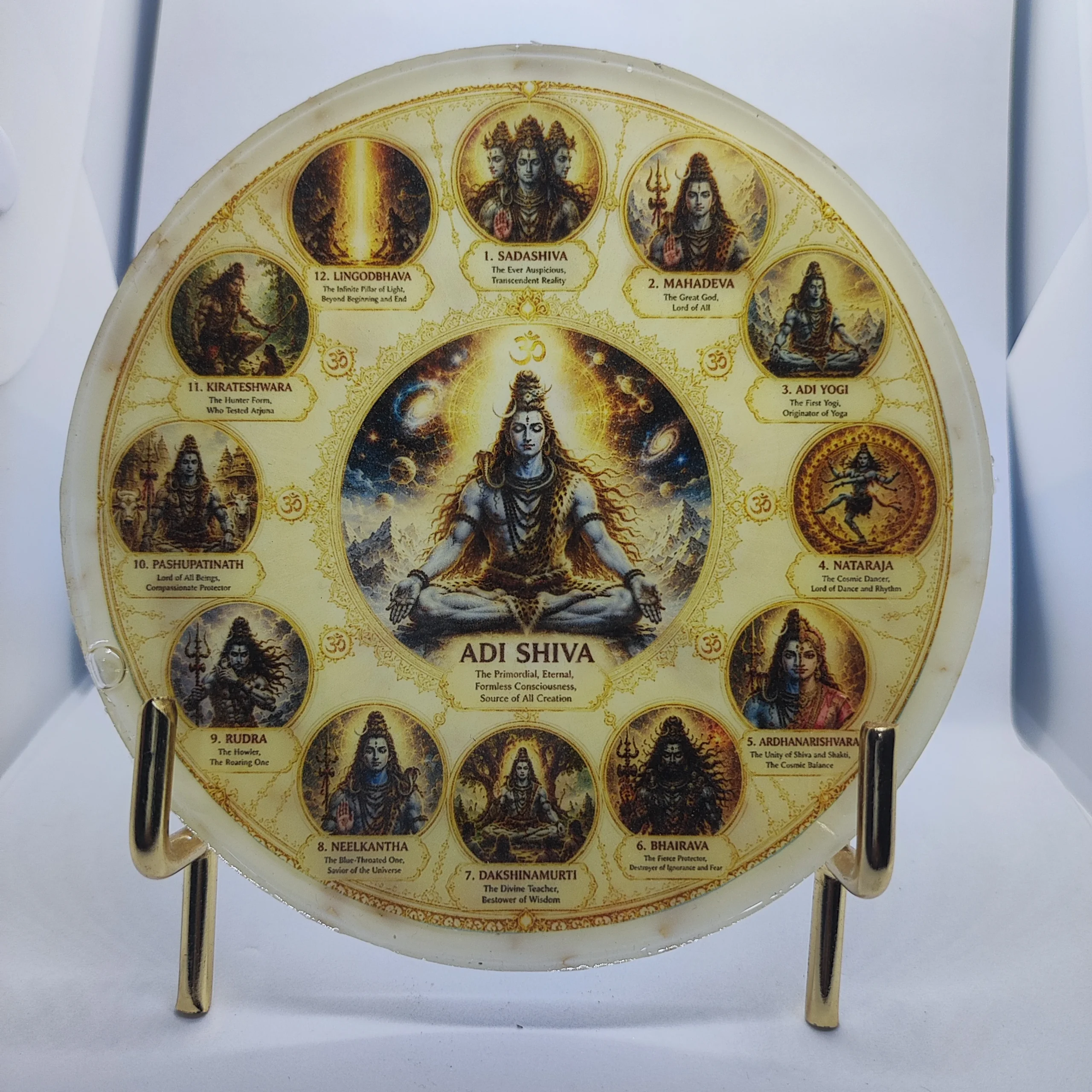 Decorative circular plate showing multiple small portraits of Hindu deities around a central figure, on a stand. - Bling On Decor® | Luxury Handmade Home Decor ANJU