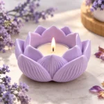 Lavender Lotus Candle Glow - Bling On Decor® | Luxury Handmade Home Decor Purple lotus-shaped candle holder with a lit tealight, surrounded by sprigs of lavender flowers. - Bling On Decor® | Luxury Handmade Home Decor ANJU